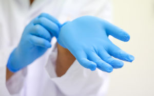 Doctor Wearing Gloves, Disposable Surgery Gloves, Protective Product Suppliers in Dubai